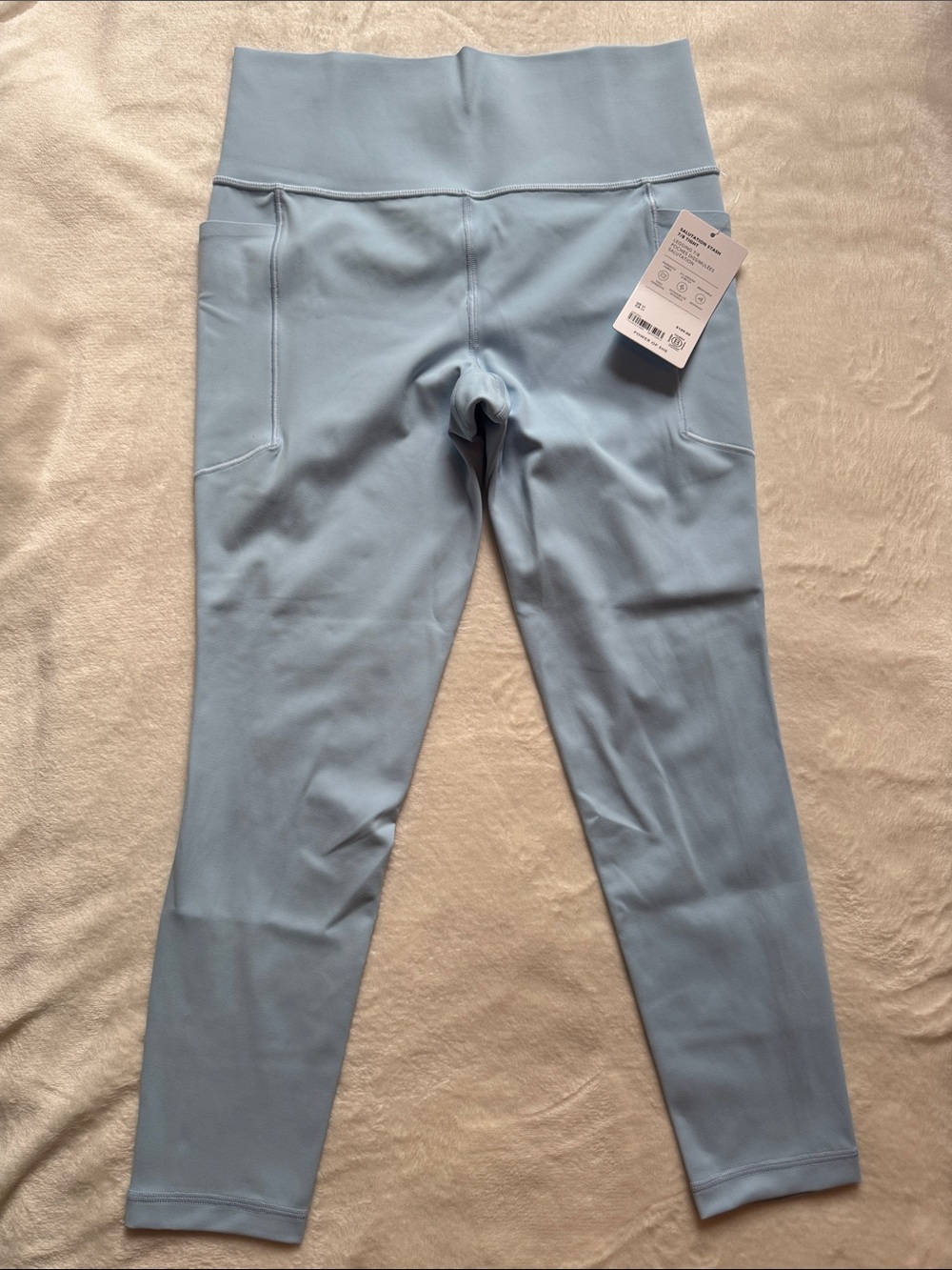 Athleta Salutation Stash 7/8 tight leggings